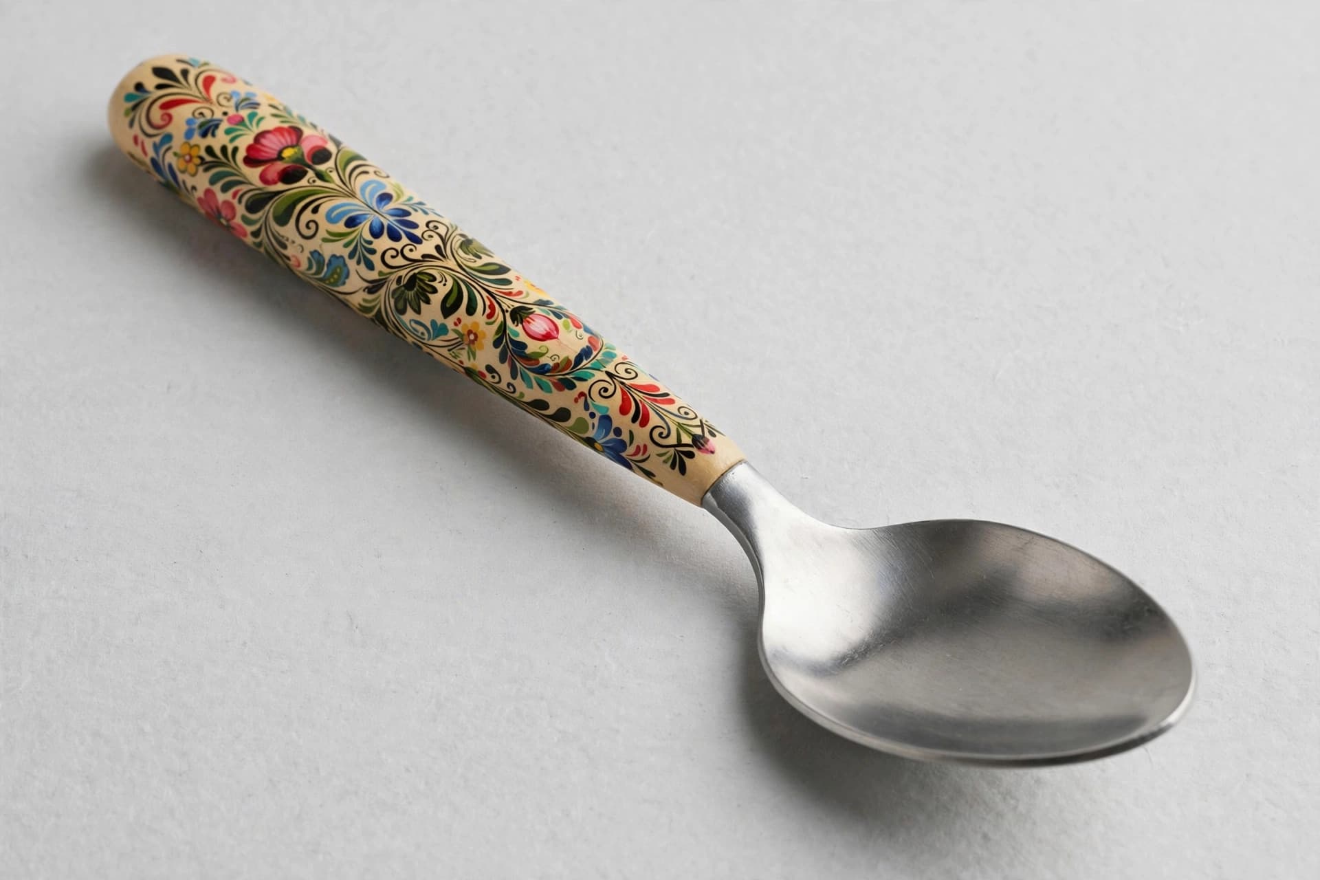 Swedish Stainless Spoon with Folk-Art Handle — Primary view