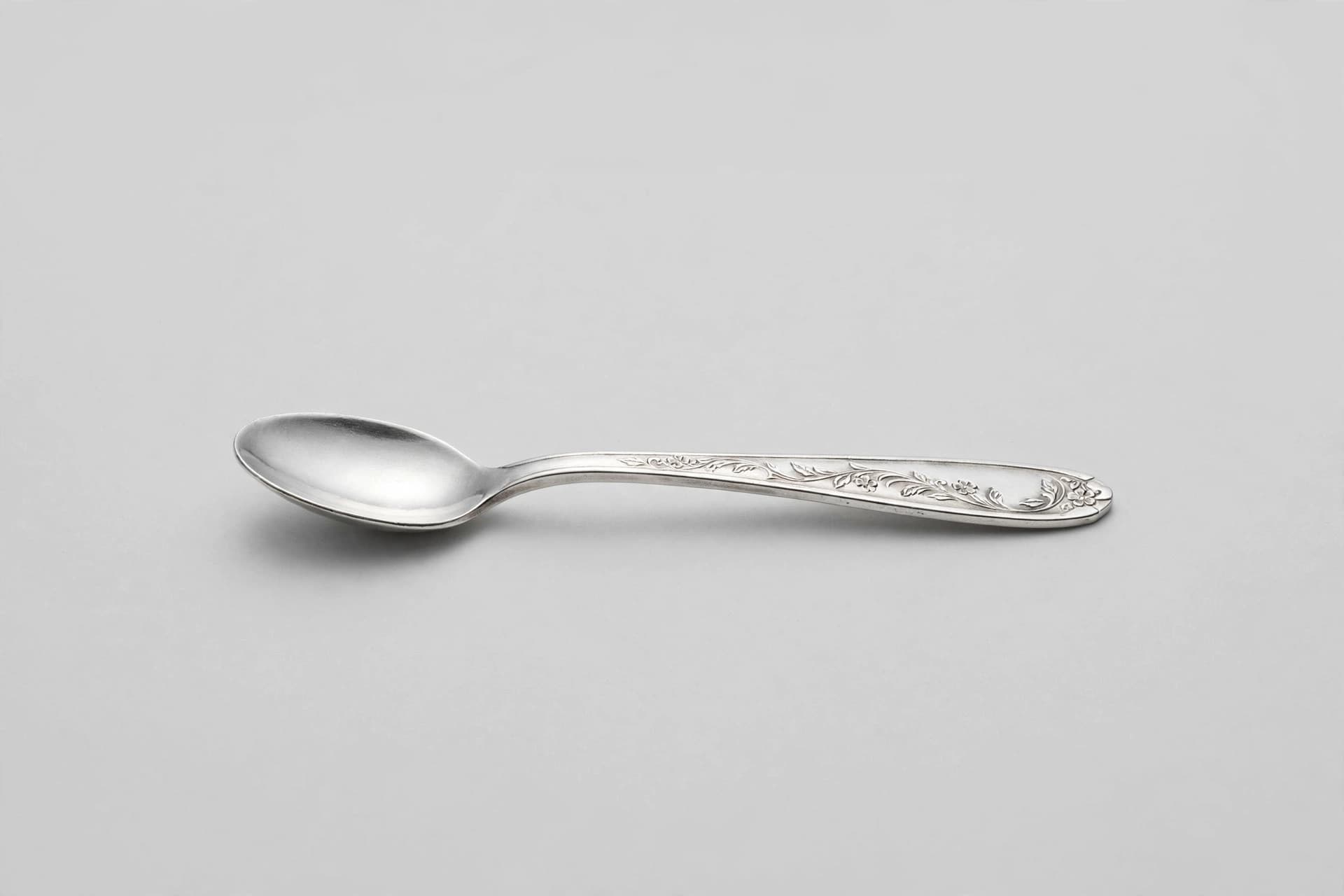 Sterling Silver Baby Spoon with Engraved Foliate Handle — Primary view
