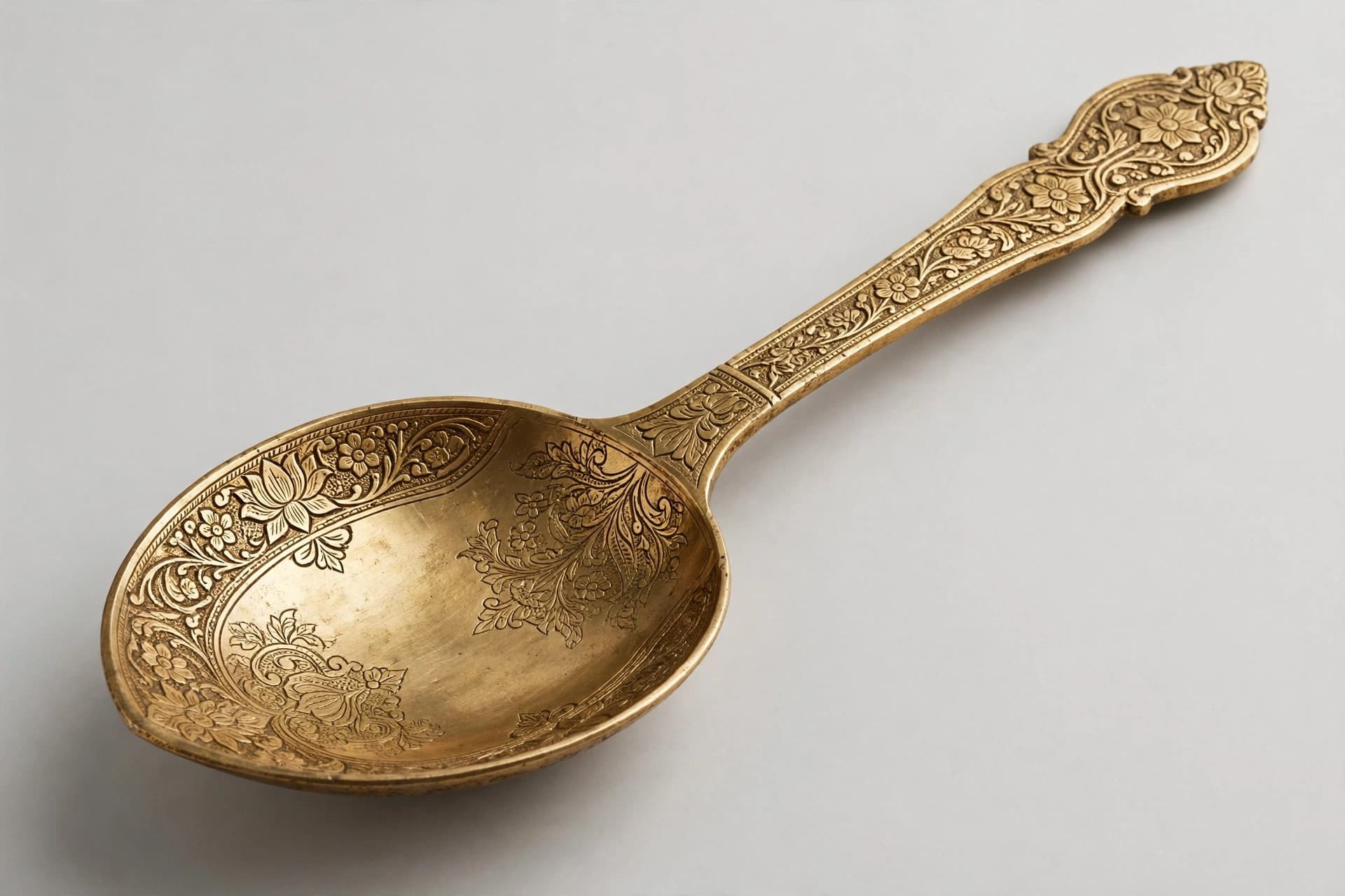 Indian Ornate Brass Serving Spoon — Primary view
